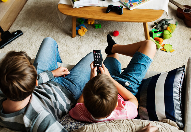 adult and child on couch