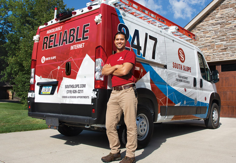 south slope employee in front of van