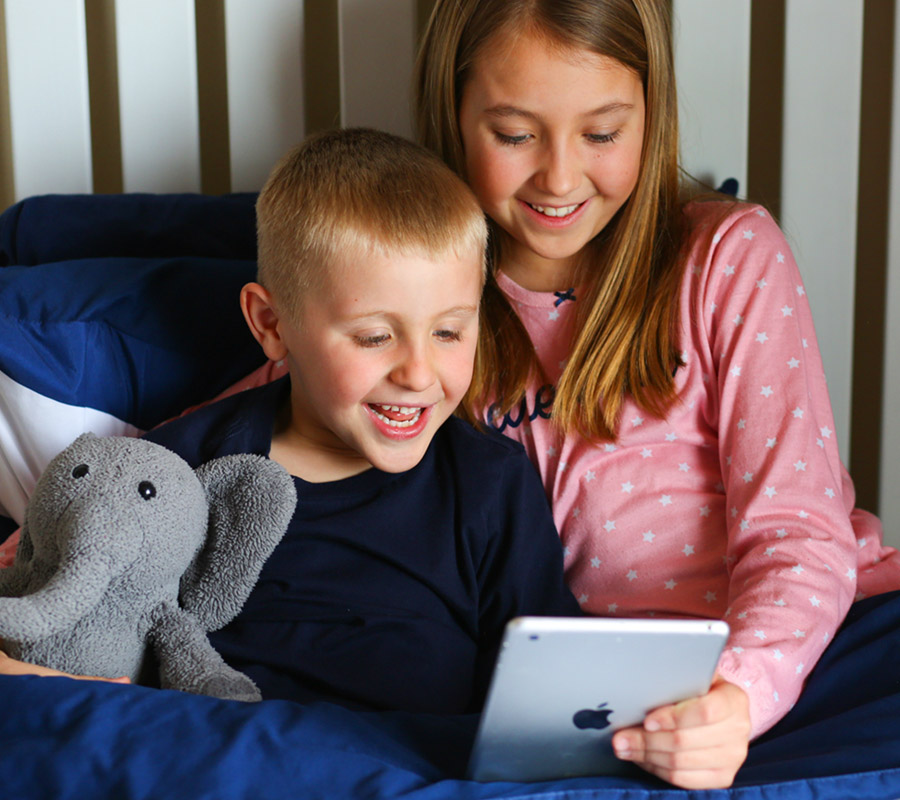 girl and boy with tablet